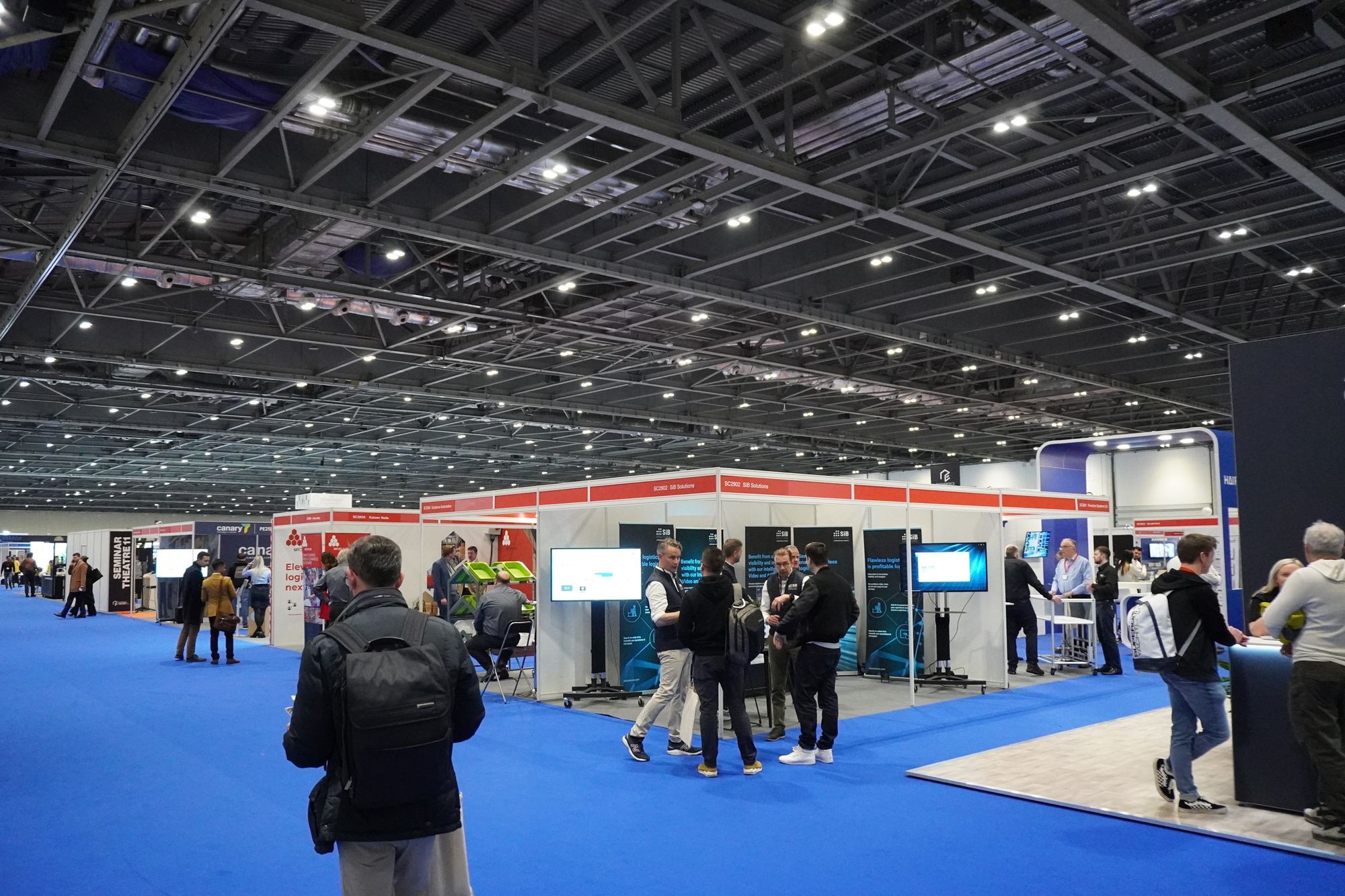 The expansive size of the Smart Retail Tech Expo, with other booths visible in the background