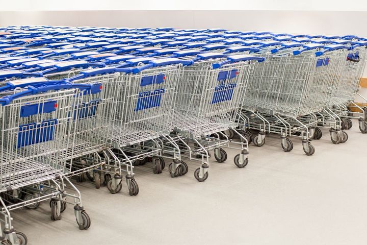 Shopping carts stacked in a supermarket.